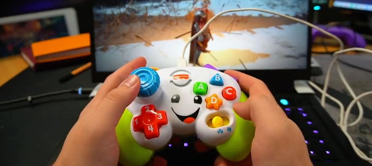 Изображение к Развивающий детский контроллер модифицировали в геймпад для игры в Elden Ring